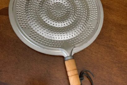 Thumbnail for The Unsung Hero Hiding in Plain Sight: Why a Rustic Simmer Ring Might Be Your Most Important Tool