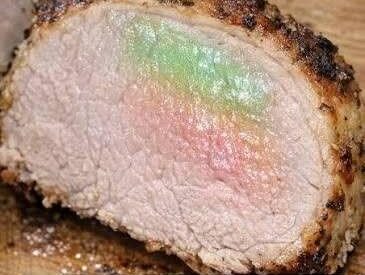 Thumbnail for Took my pork roast out of the oven and let it rest, but when I cut into it, the meat has this weird metallic green and rainbow color to it. It smells fine. Why did this happen?