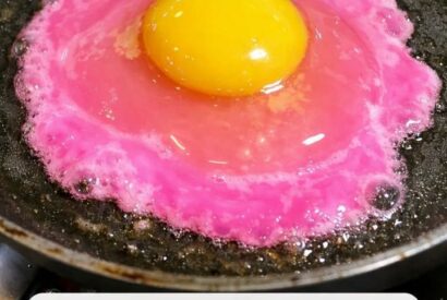 Thumbnail for I cracked an egg and the liquid is a neon pearlescent pink — is this safe?