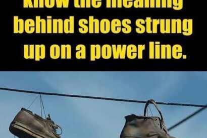 Thumbnail for The Meaning Behind Shoes Strung Up On A Power Line