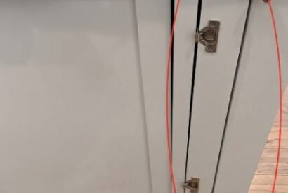 Thumbnail for What Is That Skinny Pull-Out Cabinet For? The Tiny Kitchen Feature That’s Actually Brilliant